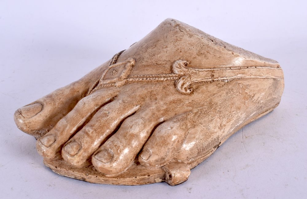 A GRAND TOUR STYLE MODEL OF A ROMAN FOOT After the Antiquity. 16 cm x 8 cm.