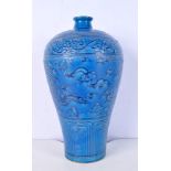 A Chinese porcelain turquoise MEIPING vase decorated in relief with a dragon vase 37 cm.