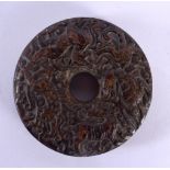 An 18TH / 19TH CENTURY CHINESE CARVED HARDSTONE BI DISK finely carved with Kylin, deer and tiger, 7c