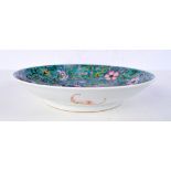 A Chinese porcelain Polychrome dish decorated with phoenix , bats and foliage 4.5 x 21cm.