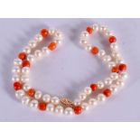 A 14CT GOLD CORAL AND PEARL NECKLACE. 28 grams. 44 cm long.