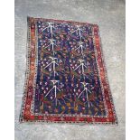 An Afghan Baluche rug 213 x 137 cm.