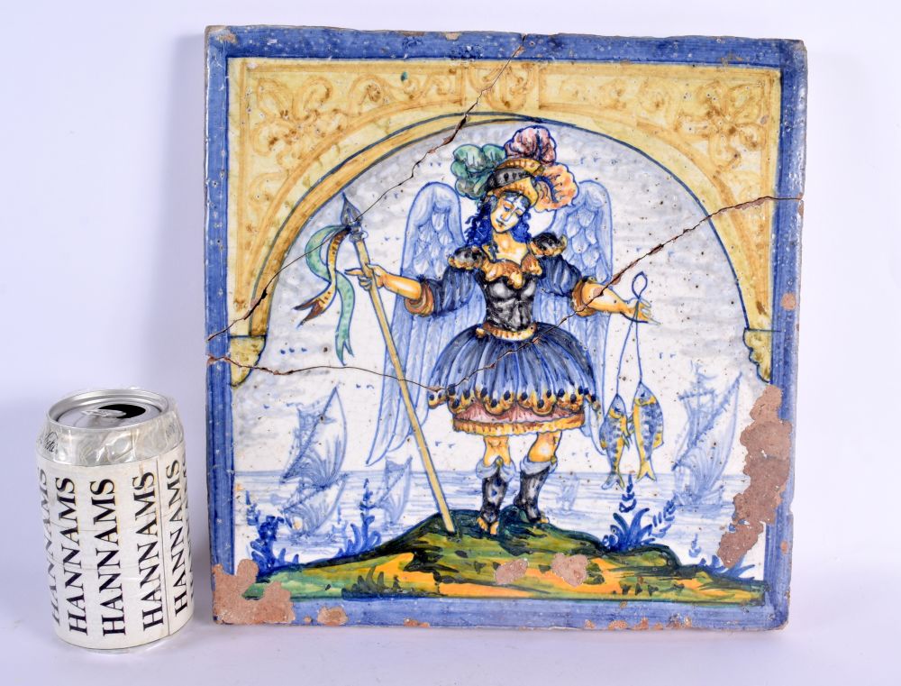 A RARE 18TH CENTURY EUROPEAN FAIENCE TIN GLAZED SQUARE TILE painted with a winged female holding fis