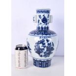 A Chinese porcelain blue and white twin handled vase decorated with phoenix and lotus. 31cm.