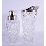 A SILVER PLATED CUT GLASS COCKTAIL SHAKER with pourer. 25 cm high. (2)