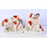 A pair of Staffordshire flat back figures depicting children being rescued from snakes by dogs 19 x