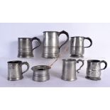 TWO WILLIAM IV PEWTER MUGS together with other similar pewter. Largest 16 cm high. (7)