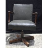 A vintage Abbess oak and leather upholstered swivel chair 77 x 55 x 44 cm.