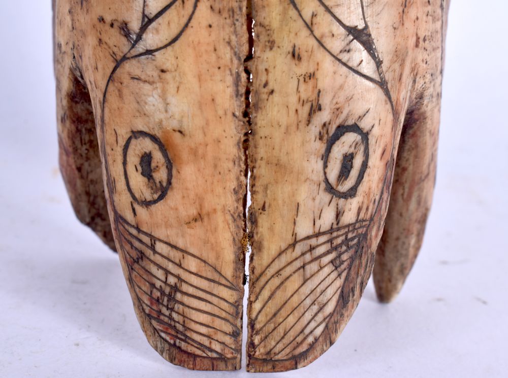 A RARE 19TH CENTURY CONTINENTAL TRIBAL CARVED AND ENGRAVED HORSE SKULL decorated with animals and mo - Image 3 of 5