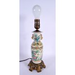 A 19TH CENTURY CHINESE FAMILLE ROSE PORCELAIN LAMP Qing. 37 cm high.