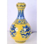 A Chinese porcelain Imperial yellow vase derated with a dragon 23 cm.
