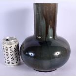 AN EARLY 20TH CENTURY EUROPEAN CHINESE STYLE POTTERY BULBOUS VASE. 27 cm x 16 cm.