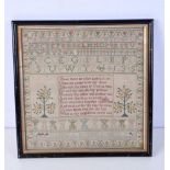 A framed Victorian sampler 32 x 32 cm.