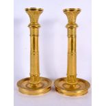 A LOVELY PAIR OF EARLY 19TH CENTURY FRENCH EMPIRE ORMOLU CANDLESTICKS decorated in relief with fish