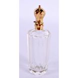 AN 18CT GOLD CRYSTAL GLASS SCENT BOTTLE. 9 cm x 3 cm.