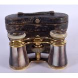 ANTIQUE CASED PAIR OF MOTHER-OF-PEARL OPERA GLASSES. 5.3cm retracted, 7.2cm extended