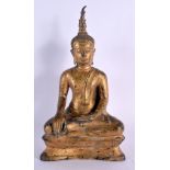 AN 18TH/19TH CENTURY SOUTH EAST ASIAN BRONZE BUDDHA formed upon a triangular base. 25 cm high.
