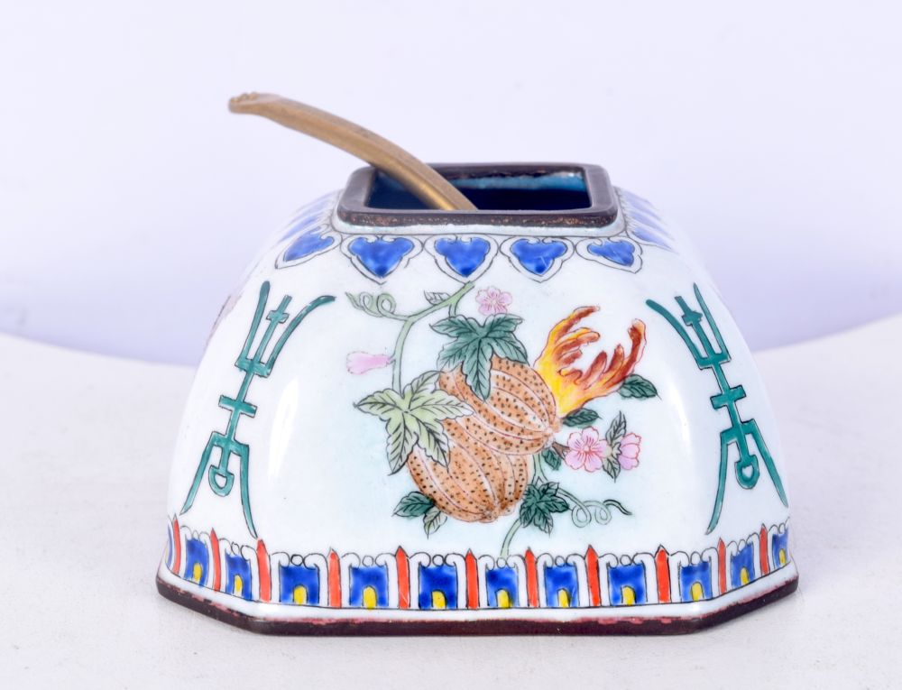 A Chinese Cloisonne enamelled seasoning pot together with a spoon 8 x 12 cm