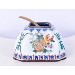 A Chinese Cloisonne enamelled seasoning pot together with a spoon 8 x 12 cm