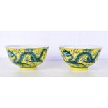 A pair of Chinese porcelain yellow ground dragon bowls 6 x 11 cm. (2).
