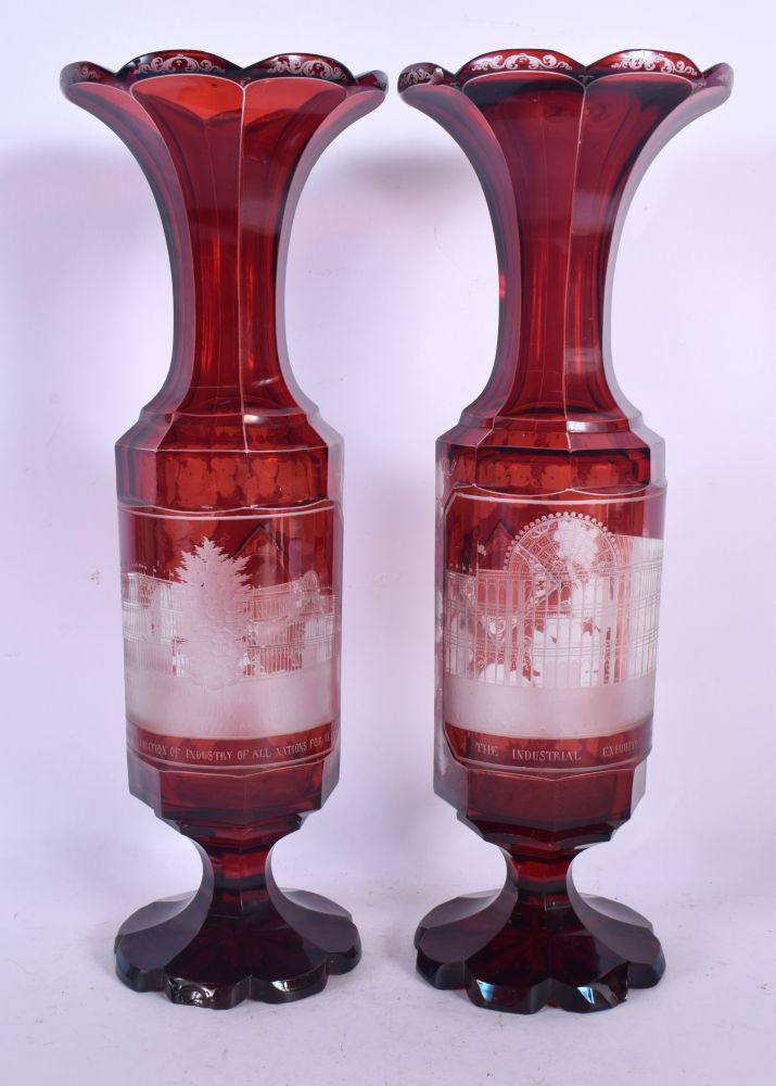 A PAIR OF LATE 19TH CENTURY BOHEMIAN CRANBERRY GLASS VASES engraved with The Great Exhibition Indust - Image 2 of 5
