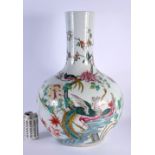 A LARGE EARLY 20TH CENTURY CHINESE FAMILLE ROSE BULBOUS VASE Late Qing/Republic, painted with birds.