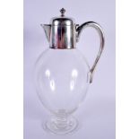 AN ART DECO SILVER MOUNTED CRYSTAL GLASS CLARET JUG. 978 grams. 27 cm x 16 cm.