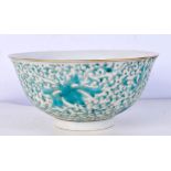 A Chinese porcelain bowl decorated in relief with foliage and blossom 8 x 16 cm.