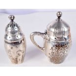 A PAIR OF EARLY 20TH CENTURY DANISH ARTS AND CRAFTS SILVER CONDIMENTS by Christian Heise of Copenhag