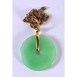 AN APPLE GREEN JADE BI DISC PENDANT NECKLACE. Pendant 3cm diameter, chain 46cm long, total weight