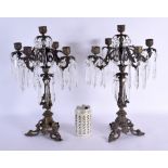 A LARGE PAIR OF 19TH CENTURY BRONZE AND CRYSTAL GLASS LUSTRE CANDLESTICKS in the rococo manner. 42 c