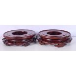 A pair of Chinese hardwood stands 6 x 22.5 cm