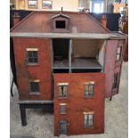 A large vintage scratch built dolls house 107 x139 x 43cm.