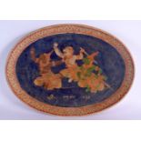 A RARE 19TH CENTURY SOUTH EAST ASIAN PAINTED POTTERY DISH Thai or Balinese, painted with mythical fi
