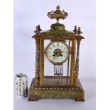 A LARGE 19TH CENTURY FRENCH ONYX CHAMPLEVE ENAMEL MANTEL CLOCK decorated with foliage. 48 cm x 22 cm