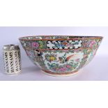 A LARGE 19TH CENTURY CHINESE CANTON FAMILLE ROSE PORCELAIN BOWL Qing, painted with figures. 33 cm x