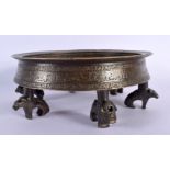 A 12TH / 13TH CENTURY PERSIAN INSCRIBED SIX FOOT BRONZE CENSER the body incised with a multitude of