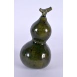 A CHINESE GREEN GLAZED PORCELAIN DOUBLE GOURD SCHOLARS OBJECT 20th Century. 11 cm high.