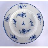 18th century Caughley soup plate painted with scattered floral sprays in blue under glaze, Crescent