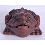 A CHINESE YIXING POTTERY FIGURE OF A LUCKY TOAD. 9 cm x 6 cm.