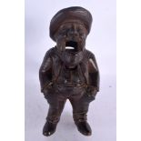 A PAIR OF ANTIQUE BAVARIAN BLACK FOREST NUT CRACKERS. 23 cm high.