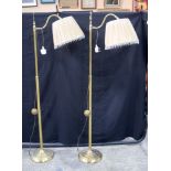 A pair of heavy brass lampstands 150 cm. (2).