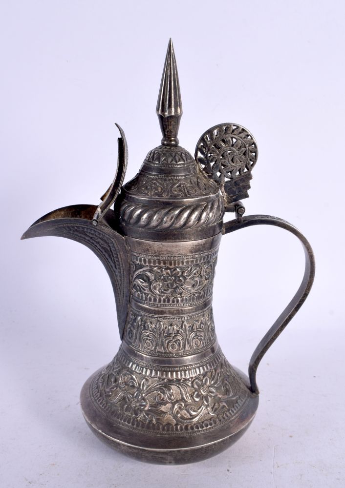 A LATE 19TH CENTURY MIDDLE EASTERN PERSIAN SILVER TEAPOT. 298 grams. 20 cm x 12 cm.