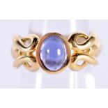 A 10CT GOLD CABOCHON SAPPHIRE RING. 7.3 grams. L.