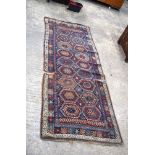 A Kurdish long rug late 19th/early 20th century 353 x 134 cm.