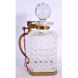 AN UNUSUAL ANTIQUE SINGLE LOCKING CUT GLASS DECANTER AND STOPPER. 25 cm high.