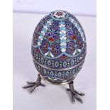 A RARE ANTIQUE RUSSIAN SILVER AND ENAMEL EASTER EGG with matching silver stand. 132 grams. 8.5 cm x