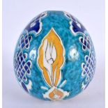 AN UNUSUAL TURKISH FAIENCE KUTAHYA HANGING BALL. 14 cm x 9 cm.