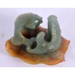 AN EARLY 20TH CENTURY CHINESE CARVED JADEITE FISH GROUP Late Qing/Republic. 8 cm x 6 cm.