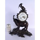 A FINE LARGE EARLY 19TH CENTURY FRENCH BRONZE MANTEL CLOCK formed as an elephant with a figural term